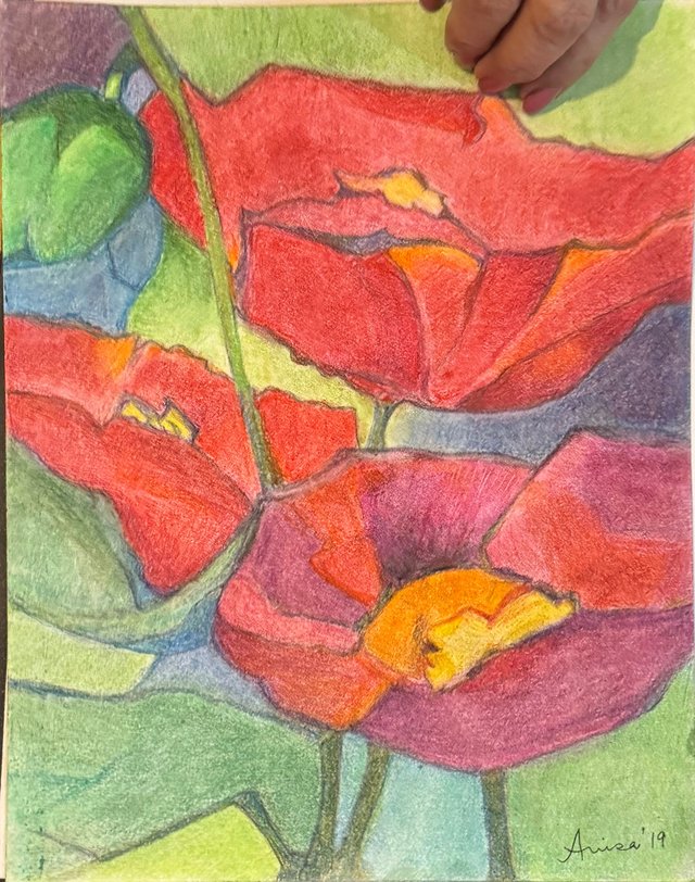 Large red flowers with yellow centres open among green leaves and dark blue shapes.